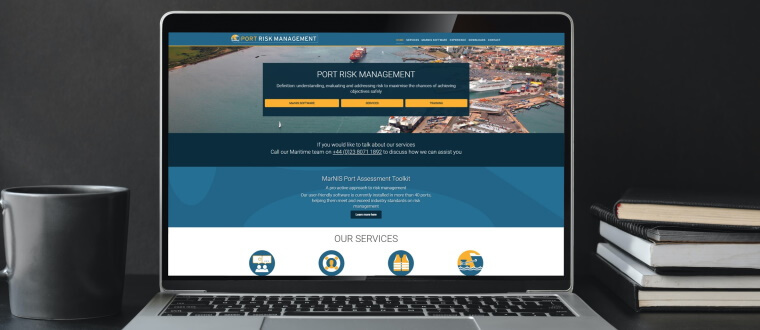 portriskmanagment.com displayed on a laptop screen